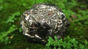 The mineral pyrite, or iron pyrite, also known as fool's gold, is an iron sulfide with the chemical formula FeS₂. Pyrite is considered the most common of the sulfide minerals. Pyrite's metallic luster and pale brass-yellow hue give it a superficial resemblance to gold, hence the well-known nickname of fool's gold. Hardness: 6–6.5 Luster: Metallic, glistening Pyrite enjoyed brief popularity in the 16th and 17th centuries as a source of ignition in earlyfirearms, most notably the wheellock, where the cock held a lump of pyrite against a circular file to strike the sparks needed to fire the gun. Pyrite is a very protective stone, shielding the user from negativeenergy of all kinds and promotes good physical health and emotional well-being.