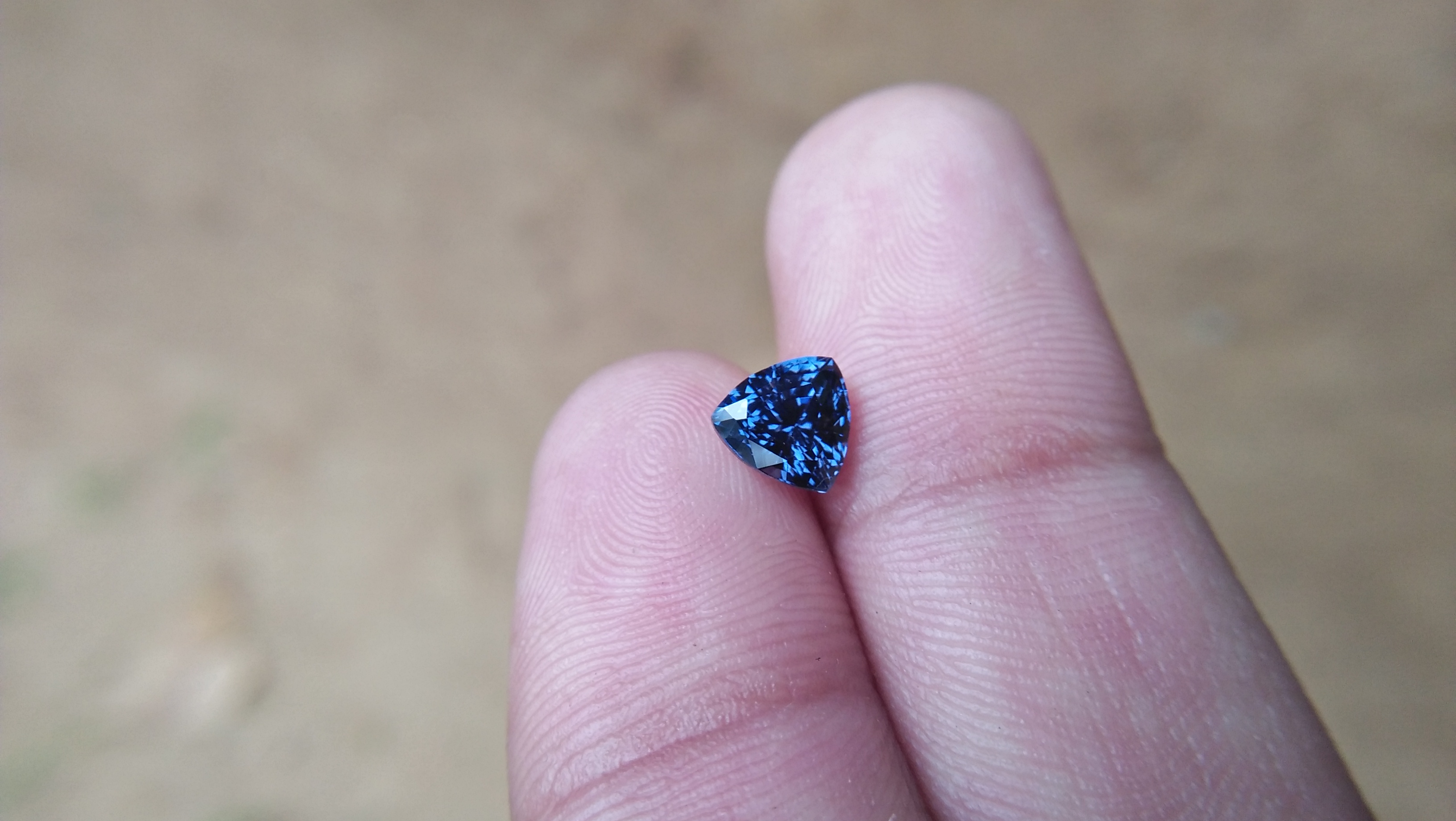 Natural Blue Spinel Shape : Trillion Clarity : Very Clean Treatment : Natural/Unheated Dimension : 6.5mm x 4.8mm Weight : 1.35Cts Colour : Blue