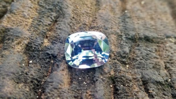 NATURAL BLUEISH WHITE SAPPHIRE Shape : Cution Dimension : 7.2mm x 6mm x 3.5mm Weight : 1.35cts Clarity : Clean Colour : Blueish white Transparency : Transparent Origin : Sri Lanka Treatment : Unheated/ Natural