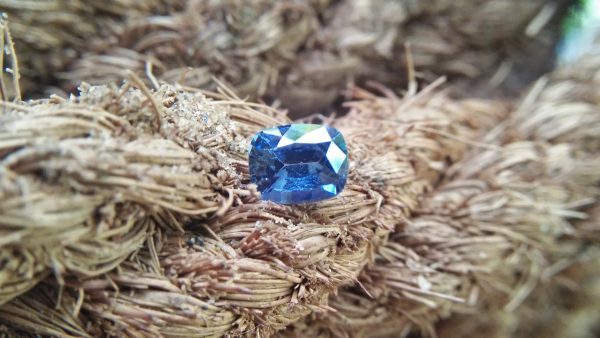 Sapphire is the birthstone for September NATURAL BLUE SAPPHIRE Shape : Cution Cut : Mixed Cut Dimension : 6.8 mmx 5.4 mm x 4.4 mm Weight : 1.50Cts Clarity : VVS Colour : Greenish Blue Transparency : Transparent