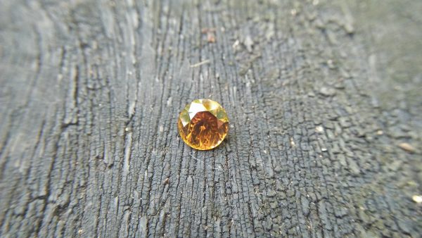 Natural Golden Honey Colour Zircon WEIGHT : 4.20Cts COLOUR : Golden Honey Yellow CUT & SHAPE : Round Flower Cut TRANSPARENCY : Transparent MEASUREMMENT : 8.85 mm x 6 mm TREATMENT : None Origin : Sri Lanka Clarity : SI