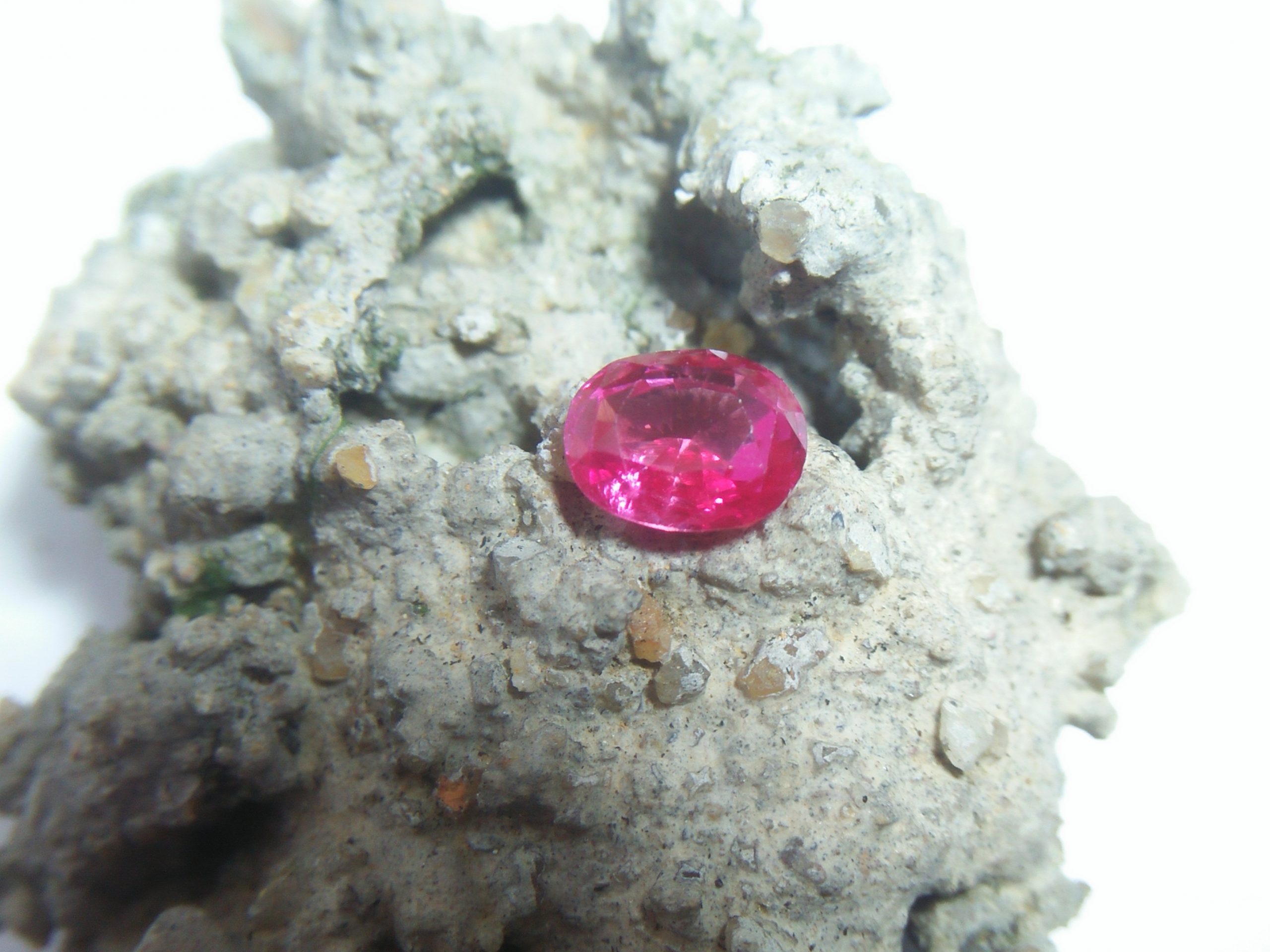 Ceylon NATURAL Pink Sapphire Colour : Hot Pink Shape : Oval Weight : 0.92 Dimension : 6.1 mm x 4.8mm x 3.4 mm Treatment : Heated Clarity : SI • CSL - Colored Stone Laboratory Certified ( GIA Alumni Association Member ) • CSL Memo No : 35E7D3E87864 Sapphire is a precious gemstone, a variety of the mineral corundum, consisting of aluminum oxide with trace amounts of elements such as iron, titanium, chromium, copper, or magnesium. Sapphire deposits are found in Eastern Australia, Thailand, Sri Lanka, China, Vietnam, Madagascar, Greenland, East Africa, and in North America in mostly in Montana. Madagascar, Sri Lanka, and Kashmir produce large quantities of fine quality Sapphires for the world market. Sapphires are mined from alluvial deposits or from primary underground workings. Blue Sapphire and Ruby are the most popular Gemstone in Corundum Family. also, Orangy Pink Sapphire is called Padparadscha. The name Drive's from the Sinhalese word "padmaraga" " පද්මරාග", meaning lotus blossom, as the stone is of a similar color to the lotus blossom. Bi-Color Sapphire from DanuGroup Collection Also, Sapphire can be found as parti-color, bi-color or fancy color. Australia is a main parti-color Sapphire producer. White Sapphire also, White sapphire is a very popular stone to wear instead of Diamond as a 3rd hardness gemstone after diamond ( moissanite hardness is 9.5). Various colors of star sapphires A star sapphire is a type of sapphire that exhibits a star-like phenomenon known as asterism. Also, A rare variety of natural sapphire, known as color-change sapphire, exhibits different colors in a different light. Sapphires can be treated by several methods to enhance and improve their clarity and color. A common method is done by heating the sapphires in furnaces to temperatures between 500 and 1,850 °C for several hours, or by heating in a nitrogen-deficient atmosphere oven for 1 week or more. Geuda is a form of the mineral corundum. Geuda is found primarily in Sri Lanka. It's a semitransparent and milky appearance due to rutile inclusions. Geuda is used to improve its color by heat treatment. Some geuda varieties turn to a blue color after heat treatments and some turn to red after oxidizing. Also, Kowangu pushparaga turns to yellow sapphire after oxidizing. Sapphire Crystal system is a Trigonal crystal system with a hexagonal scalenohedral crystal class. Sapphire hardness is 9 according to the Mohs hardness scale with 4.0~4.1 specific gravity. Refractive index ω          =1.768–1.772 nε =1.760–1.763 Solubility = Insoluble Melting point = 2,030–2,050 °C Birefringence  = 0.008 Pleochroism = Strong Luster = Vitreous Sapphire is the birthstone for September and the gem of the 45th anniversary. Healing Properties of Sapphire Sapphire releases mental tension, depression, unwanted thoughts, and spiritual confusion.  Sapphire is known as a "stone of Wisdom". It is exceptional for calming and focusing the mind, allowing the release of mental tension and unwanted thoughts. Sapphire is also the best stone for awakening chakras. Dark Blue or Indigo Sapphire stimulates the Third Eye chakra. Blue Sapphire stimulates the Throat Chakra. Green sapphire stimulates Heart Chakra. Black Sapphire stimulates Base Chakra. White sapphire stimulates Crown Chakra. Yellow sapphire stimulates Solar Plexus Chakra. Pink Sapphire Healings It is believed that pink sapphires used for therapeutic purposes as crystals might nourish the emotional well-being of the person wearing the jewelry crafted from the gems. The theory behind these therapeutic beliefs centers on clearing emotional blockages from the past to release hurtful experiences. • Nourishing the Emotional Body with the PinkColor Ray • Energetic Columns of Support • Longevity and Extending the Lifespan of Your Cells • Astral Vision and Sensitivity to Energy