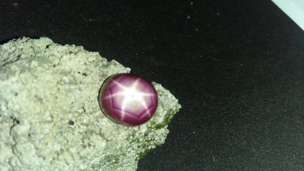 Ceylon Natural Star Ruby A star sapphire is a type of sapphire that exhibits a star-like phenomenon known as asterism. Star sapphires contain intersecting needle-like inclusions following the underlyingcrystal structure that causes the appearance of a six-rayed "star"-shaped pattern when viewed with a single overhead light source. Healing Properties Sapphire helps the user stay on the Spiritual Path, boosting psychic and spiritual powers, and is a great stone for Earth and Chakra healing. also, all corundums share some energies in common, the various colours of Sapphire have individual vibrational signatures and different spiritual properties. Sapphire was used by the Etruscans over 2,500 years ago and was also prized in ancient Rome, Greece and Egypt. Revered as a stone of royalty, sapphire was believed to keep kings safe from harm or envy.