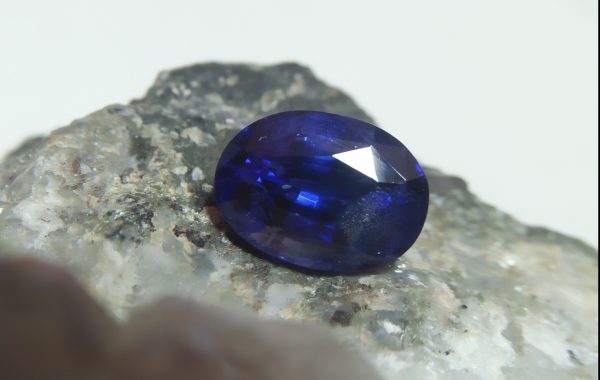NATURAL BLUE SAPPHIRE Colour : Vivid Blue "Royal Blue" Shape : Oval Weight : 2.16 CTS Dimension : 8.4 x 6.1 x 4.9 mm Treatments : Heated Clarity : SI • CSL - Colored Stone Laboratory Certified ( GIA Alumni Association Member ) • CSL Memo No : E63051265A61 Sapphire is a precious gemstone, a variety of the mineral corundum, consisting of aluminum oxide with trace amounts of elements such as iron, titanium, chromium, copper, or magnesium. Sapphire deposits are found in Eastern Australia, Thailand, Sri Lanka, China, Vietnam, Madagascar, Greenland, East Africa, and in North America in mostly in Montana. Madagascar, Sri Lanka, and Kashmir produce large quantities of fine quality Sapphires for the world market. Sapphires are mined from alluvial deposits or from primary underground workings. Blue Sapphire and Ruby are the most popular Gemstone in Corundum Family. also, Orangy Pink Sapphire is called Padparadscha. The name Drive's from the Sinhalese word "padmaraga" " පද්මරාග", meaning lotus blossom, as the stone is of a similar color to the lotus blossom. Bi-Color Sapphire from DanuGroup Collection Also, Sapphire can be found as parti-color, bi-color or fancy color. Australia is a main parti-color Sapphire producer. White Sapphire also, White sapphire is a very popular stone to wear instead of Diamond as a 3rd hardness gemstone after diamond ( moissanite hardness is 9.5). Various colors of star sapphires A star sapphire is a type of sapphire that exhibits a star-like phenomenon known as asterism. Also, A rare variety of natural sapphire, known as color-change sapphire, exhibits different colors in a different light. Sapphires can be treated by several methods to enhance and improve their clarity and color. A common method is done by heating the sapphires in furnaces to temperatures between 500 and 1,850 °C for several hours, or by heating in a nitrogen-deficient atmosphere oven for 1 week or more. Geuda is a form of the mineral corundum. Geuda is found primarily in Sri Lanka. It's a semitransparent and milky appearance due to rutile inclusions. Geuda is used to improve its color by heat treatment. Some geuda varieties turn to a blue color after heat treatments and some turn to red after oxidizing. Also, Kowangu pushparaga turns to yellow sapphire after oxidizing. Sapphire Crystal system is a Trigonal crystal system with a hexagonal scalenohedral crystal class. Sapphire hardness is 9 according to the Mohs hardness scale with 4.0~4.1 specific gravity. Refractive index ω          =1.768–1.772 nε =1.760–1.763 Solubility = Insoluble Melting point = 2,030–2,050 °C Birefringence  = 0.008 Pleochroism = Strong Luster = Vitreous Sapphire is the birthstone for September and the gem of the 45th anniversary. Healing Properties of Sapphire Sapphire releases mental tension, depression, unwanted thoughts, and spiritual confusion.  Sapphire is known as a "stone of Wisdom". It is exceptional for calming and focusing the mind, allowing the release of mental tension and unwanted thoughts. Sapphire is also the best stone for awakening chakras. Dark Blue or Indigo Sapphire stimulates the Third Eye chakra. Blue Sapphire stimulates the Throat Chakra. Green sapphire stimulates Heart Chakra. Black Sapphire stimulates Base Chakra. White sapphire stimulates Crown Chakra. Yellow sapphire stimulates Solar Plexus Chakra. Blue Sapphire stimulates the Throat Chakra and Third eye chakra, the voice of the body. Blue crystal energy will unblock and balance the Throat Chakra. blue encourages the power of truth, while lighter shades carry the power of flexibility, relaxation, and balance. Blue Sapphire can free one of mental anxiety, helps make one detached, and protects against envy. Also, It can be worn for good luck and for protection against evil spirits. Since Saturn rules the nervous system, blue sapphires help problems of the nerves-tension and neuroses-diseases caused by an afflicted Saturn.