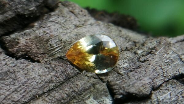 Colour : Yellow Shape : Pear Weight : 0.55 Cts Dimension : 5.9 x 3.9 x 2.9 mm Treatment : Heated Clarity : SI Sapphire is a precious gemstone, a variety of the mineral corundum, consisting of aluminum oxide with trace amounts of elements such as iron, titanium, chromium, copper, or magnesium. Sapphire deposits are found in Eastern Australia, Thailand, Sri Lanka, China, Vietnam, Madagascar, Greenland, East Africa, and in North America in mostly in Montana. Madagascar, Sri Lanka, and Kashmir produce large quantities of fine quality Sapphires for the world market. Sapphires are mined from alluvial deposits or from primary underground workings.   Blue Sapphire and Ruby are the most popular Gemstone in Corundum Family. also, Orangy Pink Sapphire is called Padparadscha. The name Drive's from the Sinhalese word "padmaraga" " පද්මරාග", meaning lotus blossom, as the stone is of a similar color to the lotus blossom. Bi-Color Sapphire from DanuGroup Collection Also, Sapphire can be found as parti-color, bi-color or fancy color. Australia is a main parti-color Sapphire producer. White Sapphire also, White sapphire is a very popular stone to wear instead of Diamond as a 3rd hardness gemstone after diamond ( moissanite hardness is 9.5). Various colors of star sapphires A star sapphire is a type of sapphire that exhibits a star-like phenomenon known as asterism. Also, A rare variety of natural sapphire, known as color-change sapphire, exhibits different colors in a different light. Sapphires can be treated by several methods to enhance and improve their clarity and color. A common method is done by heating the sapphires in furnaces to temperatures between 500 and 1,850 °C for several hours, or by heating in a nitrogen-deficient atmosphere oven for 1 week or more. Geuda is a form of the mineral corundum. Geuda is found primarily in Sri Lanka. It's a semitransparent and milky appearance due to rutile inclusions. Geuda is used to improve its color by heat treatment. Some geuda varieties turn to a blue color after heat treatments and some turn to red after oxidizing. Also, Kowangu pushparaga turns to yellow sapphire after oxidizing. Sapphire Crystal system is a Trigonal crystal system with a hexagonal scalenohedral crystal class. Sapphire hardness is 9 according to the Mohs hardness scale with 4.0~4.1 specific gravity. Refractive index ω          =1.768–1.772 nε =1.760–1.763 Solubility = Insoluble Melting point = 2,030–2,050 °C Birefringence  = 0.008 Pleochroism = Strong Luster = Vitreous Sapphire is the birthstone for September and the gem of the 45th anniversary. Healing Properties of Sapphire Sapphire releases mental tension, depression, unwanted thoughts, and spiritual confusion.  Sapphire is known as a "stone of Wisdom". It is exceptional for calming and focusing the mind, allowing the release of mental tension and unwanted thoughts. Sapphire is also the best stone for awakening chakras. Dark Blue or Indigo Sapphire stimulates the Third Eye chakra. Blue Sapphire stimulates the Throat Chakra. Green sapphire stimulates Heart Chakra. Black Sapphire stimulates Base Chakra. White sapphire stimulates Crown Chakra. Yellow sapphire stimulates Solar Plexus Chakra. Blue Sapphire stimulates the Throat Chakra, the voice of the body. Blue crystal energy will unblock and balance the Throat Chakra. blue encourages the power of truth, while lighter shades carry the power of flexibility, relaxation, and balance. Blue Sapphire can free one of mental anxiety, helps make one detached, and protects against envy. Also, It can be worn for good luck and for protection against evil spirits. Since Saturn rules the nervous system, blue sapphires help problems of the nerves-tension and neuroses-diseases caused by an afflicted Saturn.