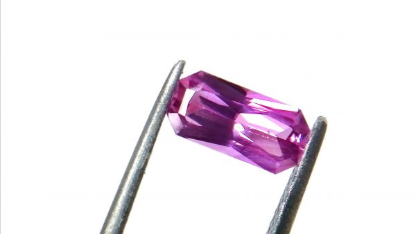 Ceylon Natural Pink Sapphire Dimension -: 8.8mm x 4.4mm x 3mm Weight -: 1.10Cts Mineral -: Ratnapura, Sri Lanka Treatment -: Unheated/Natural Colour -: Pink Clarity -: VVS Sapphire is a precious gemstone, a variety of the mineral corundum, consisting of aluminum oxidewith trace amounts of elements such as iron, titanium, chromium, copper, or magnesium. Sapphire deposits are found in Eastern Australia, Thailand, Sri Lanka, China, Vietnam, Madagascar, Greenland, East Africa, and in North America in mostly in Montana. Madagascar, Sri Lanka, and Kashmir produce large quantities of fine quality Sapphires for the world market. Sapphires are mined from alluvial deposits or from primary underground workings.   Blue Sapphire and Ruby are the most popular Gemstone in Corundum Family. also, Orangy Pink Sapphire is called Padparadscha. The name Drive’s from the Sinhalese word “padmaraga” ” පද්මරාග“, meaning lotus blossom, as the stone is of a similar color to the lotus blossom. Bi-Color Sapphire from DanuGroup Collection Also, Sapphire can be found as parti-color, bi-color or fancy color. Australia is a main parti-color Sapphire producer. White Sapphire also, White sapphire is a very popular stone to wear instead of Diamond as a 3rd hardness gemstone after diamond ( moissanite hardness is 9.5). Various colors of star sapphires A star sapphire is a type of sapphire that exhibits a star-like phenomenon known as asterism. Also, A rare variety of natural sapphire, known as color-change sapphire, exhibits different colors in a different light. Sapphires can be treated by several methods to enhance and improve their clarity and color. A common method is done by heating the sapphires in furnaces to temperatures between 500 and 1,850 °C for several hours, or by heating in a nitrogen-deficient atmosphere oven for 1 week or more. Geuda is a form of the mineral corundum. Geuda is found primarily in Sri Lanka. It’s a semitransparent and milky appearance due to rutile inclusions. Geuda is used to improve its color by heat treatment. Some geuda varieties turn to a blue color after heat treatments and some turn to red after oxidizing. Also, Kowangu pushparaga turns to yellow sapphire after oxidizing. Sapphire Crystal system is a Trigonal crystal system with a hexagonal scalenohedral crystal class. Sapphire hardness is 9 according to the Mohs hardness scale with 4.0~4.1 specific gravity. Refractive index ω          =1.768–1.772 nε =1.760–1.763 Solubility = Insoluble Melting point = 2,030–2,050 °C Birefringence  = 0.008 Pleochroism = Strong Luster = Vitreous Sapphire is the birthstone for September and the gem of the 45th anniversary. Healing Properties of Sapphire Sapphire releases mental tension, depression, unwanted thoughts, and spiritual confusion.  Sapphire is known as a “stone of Wisdom”. It is exceptional for calming and focusing the mind, allowing the release of mental tension and unwanted thoughts. Sapphire is also the best stone for awakening chakras. Dark Blue or Indigo Sapphire stimulates the Third Eye chakra. Blue Sapphire stimulates the Throat Chakra. Green sapphire stimulates Heart Chakra. Black Sapphire stimulates Base Chakra. White sapphire stimulates Crown Chakra. Yellow sapphire stimulates Solar Plexus Chakra. Pink Sapphire Healings It is believed that pink sapphires used for therapeutic purposes as crystals might nourish the emotional well-being of the person wearing the jewelry crafted from the gems. The theory behind these therapeutic beliefs centers on clearing emotional blockages from the past to release hurtful experiences. • Nourishing the Emotional Body with the PinkColor Ray • Energetic Columns of Support • Longevity and Extending the Lifespan of Your Cells • Astral Vision and Sensitivity to Energy