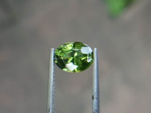 Natural Green Zircon Sri Lanka - Beccarite Zircon  Colour: Green  Shape: Oval  Weight : 1.85 Cts  Dimension : 8.1 x 6.1 x 4.5 mm  Treatment: Unheated  Clarity : SI  Origin : Sri Lanka     Zircon is a nesosilicates group mineral. Its corresponding chemical formula is ZrSiO4. The name derives from the Persian zargun, meaning "gold-hued". Zircon is a popular gemstone that has been used for nearly 2000 years.  The crystal structure of zircon is a tetragonal crystal mineral with 7.5 hardness according to the Mohs Hardness scale. Zircon is also very resistant to heat and corrosion and known as Insoluble gemstone. This Uniaxial (+) mineral Specific gravity is 4.6–4.7. It's heavy more than such as Sapphire, chrysoberyl, Garnets, spinels. Gem Businessmen use these physical properties to identify zircons from other gemstones.  Zircon has weak pleochroism and has colors such as Colorless, Very Strong Blue To Green-Blue, Yellow, Blue-Green, Yellowish Green, Yellow-Green, Brown, Orangy Yellow To Reddish Orange, Dark Brownish Red, Sometimes Purple, Gray To Bluish Gray, Brownish Gray. Colorless specimens that show gem quality are a popular substitute for diamond and are also known as "Matara diamond". Zircon has been classified into three types called high zircon, intermediate zircon ( medium zircon ), and low zircon. Some Quality Type brown zircons can be transformed into colorless and blue zircons by heating to 800 to 1000 °C.  There are Some using names for Zircon such as Hyacinth or jacinth: yellow-red, orange, red-brown to brown, Jargoon or jargon: light yellow to colorless stones, Beccarite: green zircon, Melichrysos: straw yellow, Starlite: blue heat treated zircon, Sparklite: colorless zircon. Zircon is found in Madagascar, Sri Lanka, Tanzania, Cambodia, Australia, Burma, Afghanistan, Canada, USA, Thailand, Russia, Mozambique, Norway.  Healing Properties 👇  Zircon is known as "The stone of virtue" All colors. It clears the auric negativity in the wearer and helps to communicate with the higher realm when in need. Zircon is very well known for its balancing and positive energy effects. It can attract happiness, prosperity, and abundance to the wearer.  It will bring the spiritual energy down from the higher transpersonal chakras via the crown chakra, then move it to all of the lower chakras.  Green zircon stimulates the Heart chakra. Also. It is a good crystal for meditation to open heart chakra energies. Its vibrational energies help to user stay on the spiritual path.