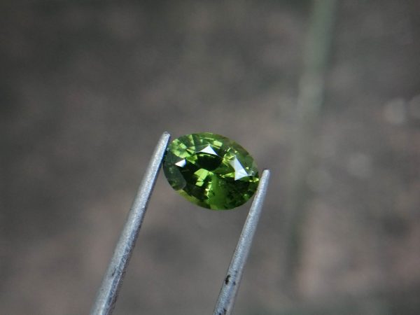 Natural Green Zircon Sri Lanka - Beccarite Zircon Colour: Green Shape: Oval Weight : 1.85 Cts Dimension : 8.1 x 6.1 x 4.5 mm Treatment: Unheated Clarity : SI Origin : Sri Lanka Zircon is a nesosilicates group mineral. Its corresponding chemical formula is ZrSiO4. The name derives from the Persian zargun, meaning "gold-hued". Zircon is a popular gemstone that has been used for nearly 2000 years. The crystal structure of zircon is a tetragonal crystal mineral with 7.5 hardness according to the Mohs Hardness scale. Zircon is also very resistant to heat and corrosion and known as Insoluble gemstone. This Uniaxial (+) mineral Specific gravity is 4.6–4.7. It's heavy more than such as Sapphire, chrysoberyl, Garnets, spinels. Gem Businessmen use these physical properties to identify zircons from other gemstones. Zircon has weak pleochroism and has colors such as Colorless, Very Strong Blue To Green-Blue, Yellow, Blue-Green, Yellowish Green, Yellow-Green, Brown, Orangy Yellow To Reddish Orange, Dark Brownish Red, Sometimes Purple, Gray To Bluish Gray, Brownish Gray. Colorless specimens that show gem quality are a popular substitute for diamond and are also known as "Matara diamond". Zircon has been classified into three types called high zircon, intermediate zircon ( medium zircon ), and low zircon. Some Quality Type brown zircons can be transformed into colorless and blue zircons by heating to 800 to 1000 °C. There are Some using names for Zircon such as Hyacinth or jacinth: yellow-red, orange, red-brown to brown, Jargoon or jargon: light yellow to colorless stones, Beccarite: green zircon, Melichrysos: straw yellow, Starlite: blue heat treated zircon, Sparklite: colorless zircon. Zircon is found in Madagascar, Sri Lanka, Tanzania, Cambodia, Australia, Burma, Afghanistan, Canada, USA, Thailand, Russia, Mozambique, Norway. Healing Properties 👇 Zircon is known as "The stone of virtue" All colors. It clears the auric negativity in the wearer and helps to communicate with the higher realm when in need. Zircon is very well known for its balancing and positive energy effects. It can attract happiness, prosperity, and abundance to the wearer. It will bring the spiritual energy down from the higher transpersonal chakras via the crown chakra, then move it to all of the lower chakras. Green zircon stimulates the Heart chakra. Also. It is a good crystal for meditation to open heart chakra energies. Its vibrational energies help to user stay on the spiritual path.