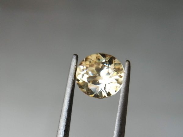 Natural Yellow Zircon Sri Lanka Colour : Light Yellow Shape : Round Weight : 3.70 Cts Dimension : 9.1 x 5.5 mm Treatment : Traditional Low-temperature heating Clarity : VS Origin : Ratnapura, Sri Lanka Zircon is a nesosilicates group mineral. Its corresponding chemical formula is ZrSiO4. The name derives from the Persian zargun, meaning "gold-hued". Zircon is a popular gemstone that has been used for nearly 2000 years. The crystal structure of zircon is a tetragonal crystal mineral with 7.5 hardness according to the Mohs Hardness scale. Zircon is also very resistant to heat and corrosion and known as Insoluble gemstone. This Uniaxial (+) mineral Specific gravity is 4.6–4.7. It's heavy more than such as Sapphire, chrysoberyl, Garnets, spinels. Gem Businessmen use these physical properties to identify zircons from other gemstones. Zircon has weak pleochroism and has colors such as Colorless, Very Strong Blue To Green-Blue, Yellow, Blue-Green, Yellowish Green, Yellow-Green, Brown, Orangy Yellow To Reddish Orange, Dark Brownish Red, Sometimes Purple, Gray To Bluish Gray, Brownish Gray. Colorless specimens that show gem quality are a popular substitute for diamond and are also known as "Matara diamond". Zircon has been classified into three types called high zircon, intermediate zircon ( medium zircon ), and low zircon. Some Quality Type brown zircons can be transformed into colorless and blue zircons by heating to 800 to 1000 °C. There are Some using names for Zircon such as Hyacinth or jacinth: yellow-red, orange, red-brown to brown, Jargoon or jargon: light yellow to colorless stones, Beccarite: green zircon, Melichrysos: straw yellow, Starlite: blue heat treated zircon, Sparklite: colorless zircon. Zircon is found in Madagascar, Sri Lanka, Tanzania, Cambodia, Australia, Burma, Afghanistan, Canada, USA, Thailand, Russia, Mozambique, Norway. Healing Properties 👇 Zircon is known as "The stone of virtue" All colors. It clears the auric negativity in the wearer and helps to communicate with the higher realm when in need. Zircon is very well known for its balancing and positive energy effects. It can attract happiness, prosperity, and abundance to the wearer. It will bring the spiritual energy down from the higher transpersonal chakras via the crown chakra, then move it to all of the lower chakras.