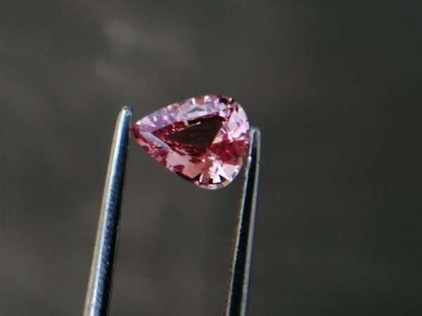 Best Quality Padparadscha Sapphire Sri Lanka Colour: Orangy Pink "Padparadscha" Shape : Pear Weight : 0.88 Cts Dimension : 6.9 x 5.5 x 3.2 mm Treatment : Unheated Clarity : VVS • CSL - Colored Stone Laboratory Certified ( GIA Alumni Association Member ) Sapphire is a precious gemstone, a variety of the mineral corundum, consisting of aluminium-oxide with trace amounts of elements such as iron, titanium, chromium, copper, or magnesium. Sapphire deposits are found in Eastern Australia, Thailand, Sri Lanka, China, Vietnam, Madagascar, Greenland, East Africa, and in North America in mostly in Montana. Madagascar, Sri Lanka, and Kashmir produce large quantities of fine quality Sapphires for the world market. Sapphires are mined from alluvial deposits or from primary underground workings. Blue Sapphire and Ruby are the most popular Gemstone in Corundum Family. also, Orangy Pink Sapphire is called Padparadscha. The name Drive's from the Sinhalese word "padmaraga" " පද්මරාග", meaning lotus blossom, as the stone is of a similar colour to the lotus blossom. Also, Sapphire can be found as parti-colour, bi-colour or fancy colour. Australia is a main parti-colour Sapphire producer. also, White sapphire is a very popular stone to wear instead of Diamond as a 3rd hardness gemstone after diamond ( moissanite hardness is 9.5). A star sapphire is a type of sapphire that exhibits a star-like phenomenon known as asterism. Also, A rare variety of natural sapphire, known as colour-change sapphire, exhibits different colours in a different light. Sapphires can be treated by several methods to enhance and improve their clarity and colour. A common method is done by heating the sapphires in furnaces to temperatures between 500 and 1,850 °C for several hours, or by heating in a nitrogen-deficient atmosphere oven for 1 week or more. Geuda is a form of the mineral corundum. Geuda is found primarily in Sri Lanka. It's a semitransparent and milky appearance due to rutile inclusions. Geuda is used to improve its colour by heat treatment. Some geuda varieties turn to a blue colour after heat treatments and some turn to red after oxidizing. Also, Kowangu pushparaga turns to yellow sapphire after oxidizing. Sapphire Crystal system is a Trigonal crystal system with hexagonal scalenohedral crystal class. Sapphire hardness is 9 according to the Mohs hardness scale with 4.0~4.1 specific gravity. Refractive index ω=1.768–1.772 nε =1.760–1.763 Solubility = Insoluble Melting point = 2,030–2,050 °C Birefringence  = 0.008 Pleochroism = Strong Luster = Vitreous Sapphire is the birthstone for September and the gem of the 45th anniversary. Gemstones Properties We must remember that the most powerful of all is our mind power. The use of gemstones in the chemical, wave and vibration energy of the gemstones can only be of some help to the well being of man. It is like a fence on the stairs. The stair fence is not essential for climbing stairs. But having a stair fence will make it easier to climb the stairs. That is also the case with using a gemstone. Almost every gem has its own vibrational and waves energy. also, the chemical properties of the gemstones are very special. Gemstones are used to cure diseases and to stimulate and balance the energy fields of the human body by the chemical composition and other energies of the gemstones. Healing Properties of Sapphire Sapphire releases mental tension, depression, unwanted thoughts, and spiritual confusion.  Sapphire is known as a "stone of Wisdom". It is exceptional for calming and focusing the mind, allowing the release of mental tension and unwanted thoughts. Sapphire is also the best stone for awakening chakras. Dark Blue or Indigo Sapphire stimulates the Third Eye chakra. Blue Sapphire stimulates the Throat Chakra. Green sapphire stimulates Heart Chakra. Ruby stimulates Base Chakra. White sapphire and purple sapphire stimulate Crown Chakra. Yellow sapphire stimulates Solar Plexus Chakra. Orange sapphire stimulates Navel Chakra. Padparadscha Sapphire Healings Properties Padparadscha sapphire helps to ease blood pressure and improves lung functioning. It is very beneficial for people suffering from brain-related disorders. Also, Padparadscha Sapphires are highly activating and purifying to the Sacral Chakra. Its orangy-pink colour energies bring joy and friendship, pleasure. Padparadscha Sapphire also uses as an excellent meditative tool for user stay on the spiritual path. Also, Padparadscha sapphire highly works with sun energies according to Ancient astrological science. Practically, We have the experience, Sun colour waves increase Padparadscha stone colour. Best Quality Padparadscha Sapphire Sri Lanka