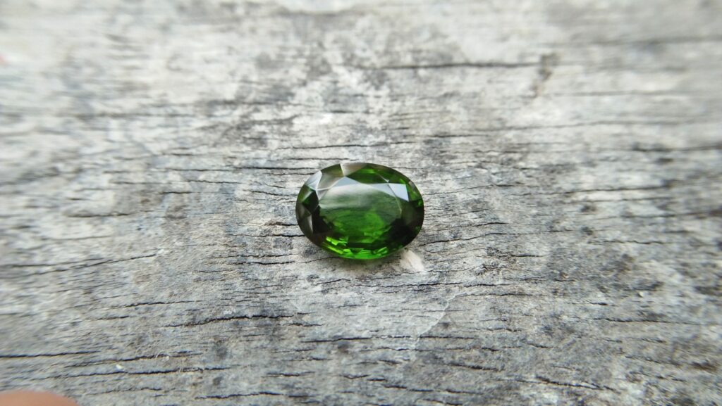 Zircon is a mineral belonging to the group of nesosilicates. Its chemical name is zirconium silicate, and its corresponding chemical formula is ZrSiO₄. Green colour Zircons are rare colour veriety of zircon family. Zircon has an anti-spasmodic effect on the liver and gall bladder of the wearer. Green Zircon helps one open up to make new friends and draws wealth