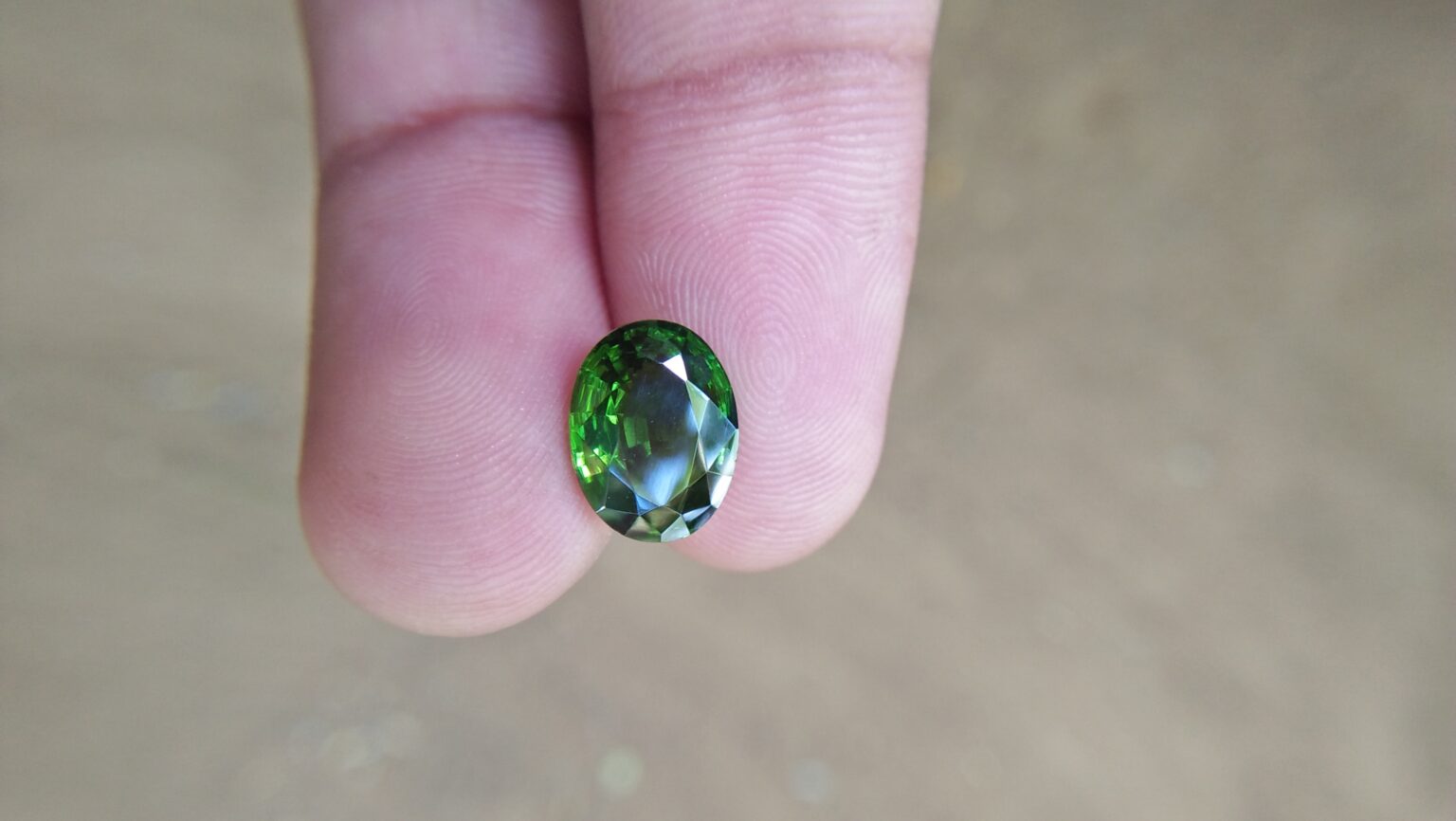 Zircon is a mineral belonging to the group of nesosilicates. Its chemical name is zirconium silicate, and its corresponding chemical formula is ZrSiO₄. Green colour Zircons are rare colour veriety of zircon family. Zircon has an anti-spasmodic effect on the liver and gall bladder of the wearer. Green Zircon helps one open up to make new friends and draws wealth