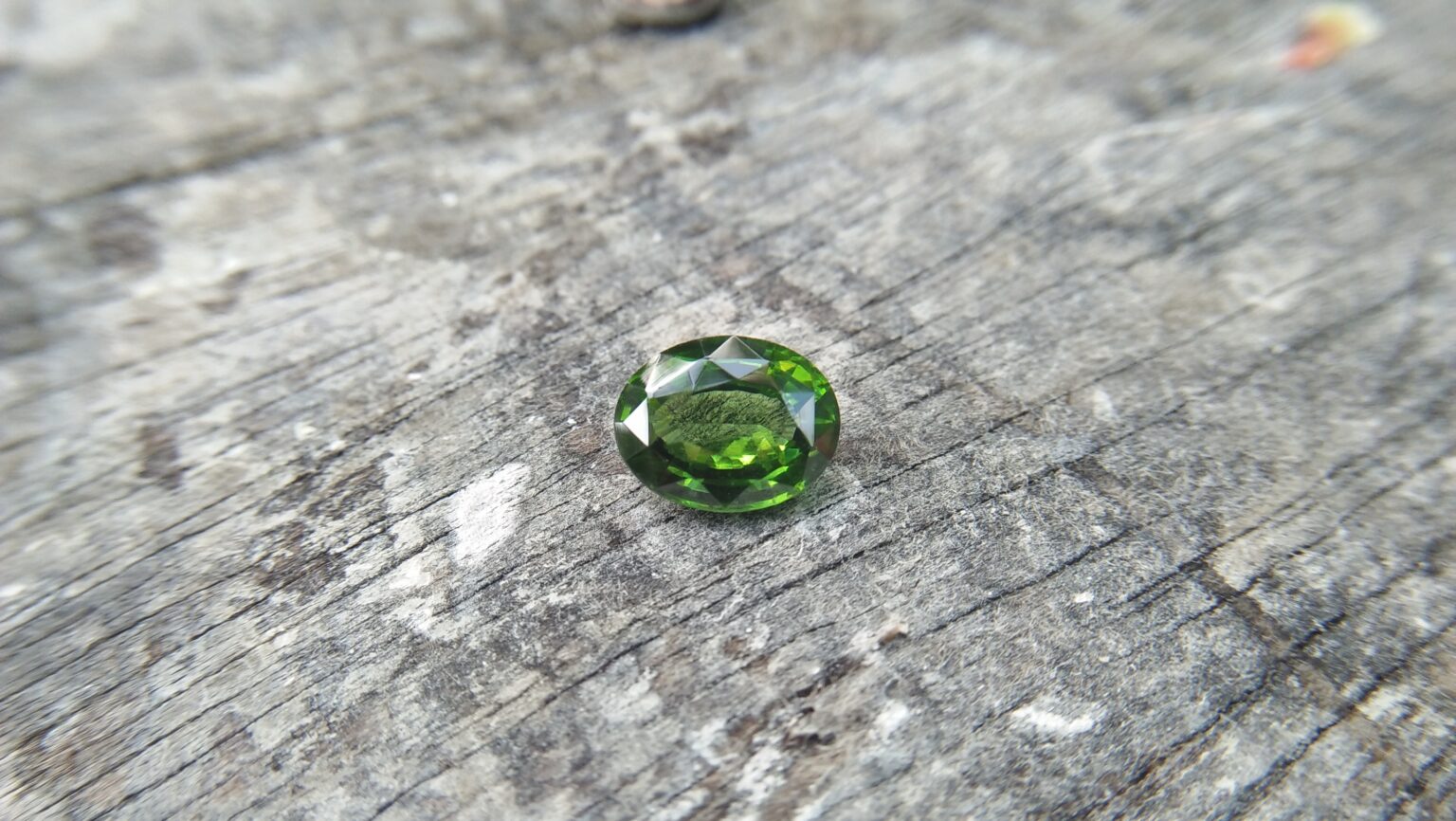Zircon is a mineral belonging to the group of nesosilicates. Its chemical name is zirconium silicate, and its corresponding chemical formula is ZrSiO₄. Green colour Zircons are rare colour veriety of zircon family. Zircon has an anti-spasmodic effect on the liver and gall bladder of the wearer. Green Zircon helps one open up to make new friends and draws wealth
