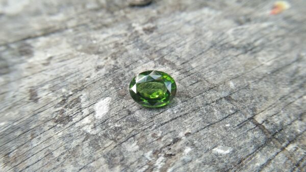 Zircon is a mineral belonging to the group of nesosilicates. Its chemical name is zirconium silicate, and its corresponding chemical formula is ZrSiO₄. Green colour Zircons are rare colour veriety of zircon family. Zircon has an anti-spasmodic effect on the liver and gall bladder of the wearer. Green Zircon helps one open up to make new friends and draws wealth