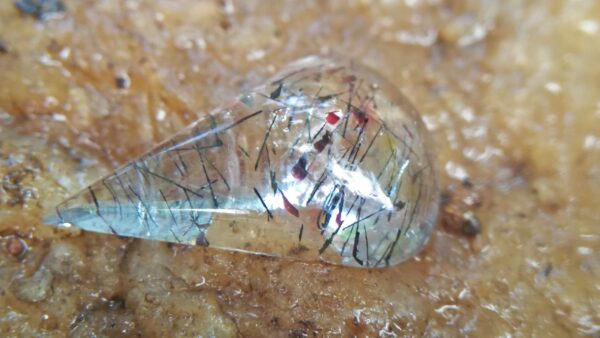 Pretty Cool Rutile Quartz 14mm x 9.5mm x 3.3mm dimension with very attractive rutile and copper, crystals Rutile is a Latin word means reddish color. It creates a dramatic effect in the stone. Its refractive index is very high and has great effect because it gives out an ancient energy. Healing properties Regeneration of tissues and lowering the ageing process. It works round the stomach and the imbalance is reduced. It treats illness of the respiratory track. It helps in removing energy blockages in the body and one’s physical well-beingm https://youtu.be/Ov3oPXhwPYM