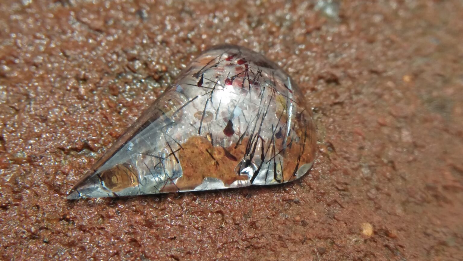 Pretty Cool Rutile Quartz 14mm x 9.5mm x 3.3mm dimension with very attractive rutile and copper, crystals Rutile is a Latin word means reddish color. It creates a dramatic effect in the stone. Its refractive index is very high and has great effect because it gives out an ancient energy. Healing properties Regeneration of tissues and lowering the ageing process. It works round the stomach and the imbalance is reduced. It treats illness of the respiratory track. It helps in removing energy blockages in the body and one’s physical well-beingm https://youtu.be/Ov3oPXhwPYM