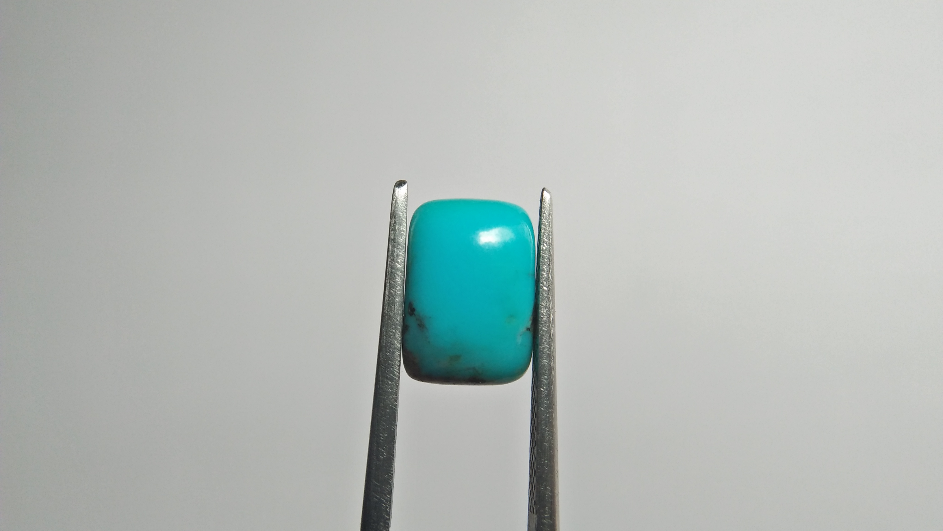 Natural Torquoise 11.5mm x 8mm x 3.5 mm dimension super healing stone for Headaches 🌍 Turquoise is an opaque, blue-to-green mineral that is a hydrated phosphate of copper and aluminium, with the chemical formula CuAl₆(PO₄)₄(OH)₈·4H₂O. In Western culture, turquoise is also the traditional birthstone for those born in the month of December. In many cultures of the Old and New Worlds, this gemstone has been esteemed for thousands of years as a holy stone, a bringer of good fortune or a talisman. The oldest evidence for this claim was found in Ancient Egypt, where grave furnishings with turquoise inlay were discovered, dating from approximately 3000 BCE.