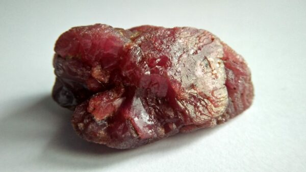 A ruby is a pink to blood-red colored gemstone, a variety of the mineral corundum. Other varieties of gem-quality corundum are called sapphires. Category: Oxide mineral variety Formula: aluminium oxide with chromium, Al2O3:Cr Crystal system: Trigonal Crystal class: Hexagonal Mohs scale: hardness 9.0 Luster: Subadamantine, vitreous, pearly Specific gravity: 3.97 – 4.05 Optical properties: Uniaxial - Refractive index: nω=1.768–1.772 nε=1.760–1.763 Ruby is a powerful stone to shield against negative energy, psychic attack, and energy vampirism, especially of the heart energy.Ruby is a stone of Divine creativity. It boosts your energy levels and promotes high self-esteem, intuition, and spiritual wisdom. According to astrology generally ruby should be worn in ring finger of right hand. Ruby is one of the most popular gemstones, and is used extensively in Jewelry. Ruby is used in all forms of jewelry, including bracelets, necklaces, rings, and earrings.