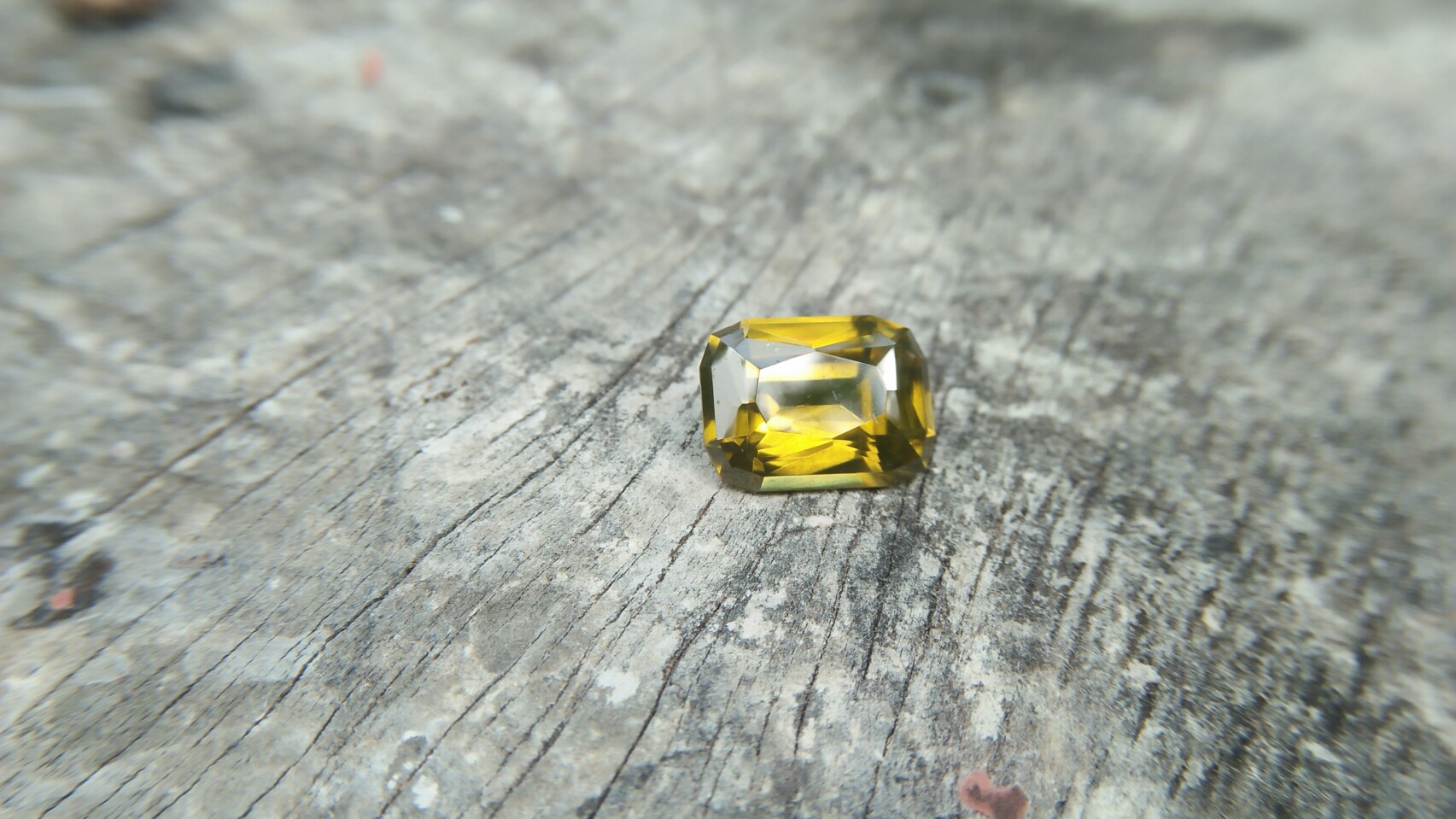 Ceylon Natural Melichrysos Weight : 6.85Cts Dimension : 12.1mm x 9.1mm x 5.9mm Colour : Greenish Yellow Treatment : Unheated/ Natural Clarity : Clean Mineral : Ratnapura Sri Lanka