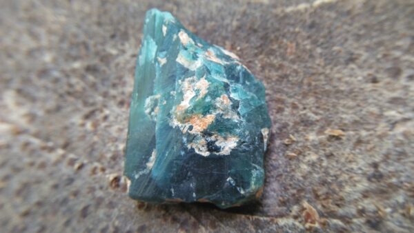 Extremely Rare Gemstone - Natural Grandidierite Grandidierite is an extremely rare mineral and gem that was first discovered in 1902 in southern Madagascar. Grandidierite is nesosilicates mineral with the chemical formula (Mg, Fe2+)(Al, Fe3+)3(SiO4)(BO3)O2.                                                                  It is found colors such as Bluish-green, greenish-blue with 7½ hardness according to the more hardness scale. Grandidierite can be seen Vitreous, Pearly luster stones with 2.98 - 2.99 Specific Gravity. This gemstone was named in honor of French explorer Alfred Grandidier who studied the natural history of Madagascar. He is a French explorer and Naturalist. Grandidierite has very strong dispersion and Visible Pleochroism, It is a Nesosilicates orthorhombic Mineral with Biaxial (-) Optical Properties. Inside of grandidierite mostly can be seen very perfect cleavages. As an optical properties, it has a 1.583 - 1.639 refractive index. Grandidierite can be found in India, Germany, Denmark, Malawi, Namibia, India, Norway, and Sri Lanka. Grandidierite's main source is Madagascar. Healing Properties of Grandidierite Grandidierite is a blue gemstone that promotes spiritual awakening, peace, and tranquility and can encourage you to communicate in a calm and clear manner.