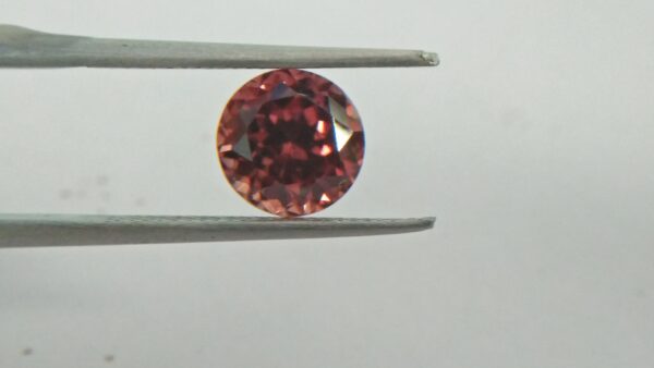 Natural Colour Change Zircon Very fine quality luster Weight: 4.45Cts Dimension: 8.7mm x 6.2mm Shape : Round Clarity : Clean Treatment : None/ Natural/ Unheated Colour: changing Colours Brown, Peach, pinkish purple, Red