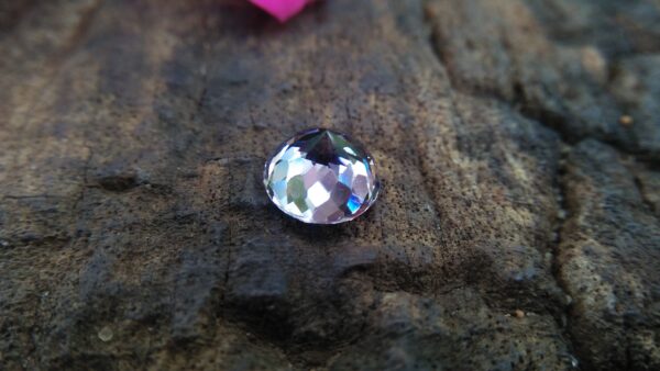 Natural Violetish Gray Spinel Shape : Round Cut : Round Flower Cut Clarity : SI Treatment : Natural/Unheated Dimension : 7.25 mm x 5.3 mm Weight : 2.05Cts Location : City of Gem Ratnapura Sri Lanka
