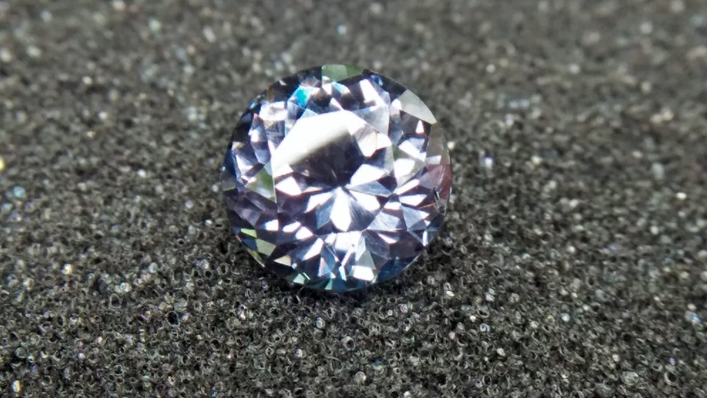 Natural Violetish Gray Spinel Shape : Round Cut : Round Flower Cut Clarity : SI Treatment : Natural/Unheated Dimension : 7.25 mm x 5.3 mm Weight : 2.05Cts Location : City of Gem Ratnapura Sri Lanka
