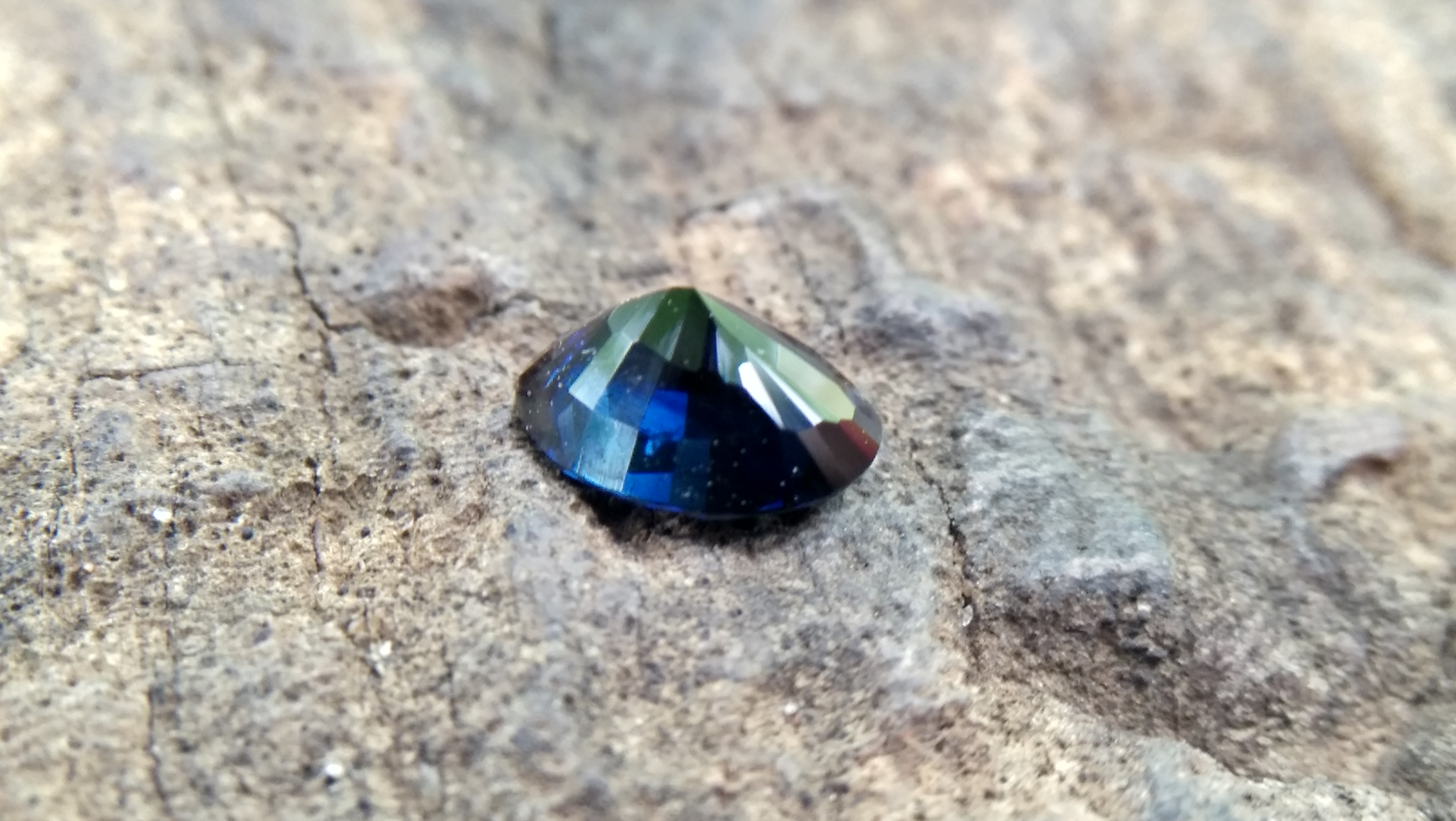 Natural Dark Blue Sapphire ( Kakanil ) කාකනිල් සෙනසුරු ග්‍රහයාට අයත් මැණික Stone of Saturn Shape : Ovel Clarity : Clean Treatment : Natural/Unheated Dimension : 5.9mm x 4.8mm x 3.3mm Weight : 0.79Cts Location : City of Gem Ratnapura Sri Lanka