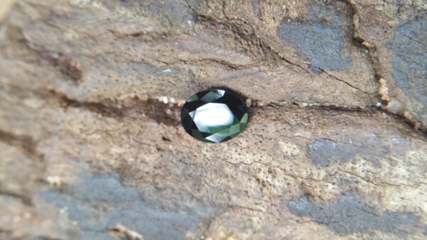 Natural Dark Blue Sapphire ( Kakanil ) කාකනිල් සෙනසුරු ග්‍රහයාට අයත් මැණික Stone of Saturn Shape : Ovel Clarity : Clean Treatment : Natural/Unheated Dimension : 5.9mm x 4.8mm x 3.3mm Weight : 0.79Cts Location : City of Gem Ratnapura Sri Lanka