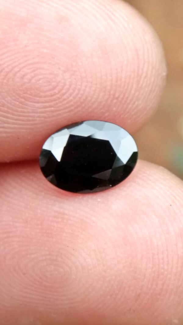 Natural Dark Blue Sapphire ( Kakanil ) කාකනිල් සෙනසුරු ග්‍රහයාට අයත් මැණික/ Stone of Saturn Shape : Ovel Clarity : Clean Treatment : Natural/Unheated Dimension : 7.3mmx 5.3mm x 3.9mm Weight : 1.55Cts Location : City of Gem Ratnapura Sri Lanka