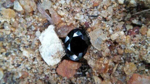 Natural Dark Blue Sapphire ( Kakanil ) කාකනිල් සෙනසුරු ග්‍රහයාට අයත් මැණික/ Stone of Saturn Shape : Ovel Clarity : Clean Treatment : Natural/Unheated Dimension : 7.3mmx 5.3mm x 3.9mm Weight : 1.55Cts Location : City of Gem Ratnapura Sri Lanka