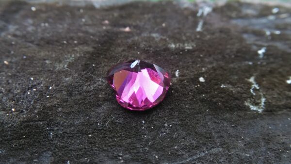 Natural Colour Change Rhodolite Garnet Weight : 2.10Cts Dimension: 7.6 mm x 8.3mm x 4.7 mm Colour: changing colors Red to purplish pink Clarity : Clean Shape : Heart Birthstone : January Treatment : Unheated/Natural