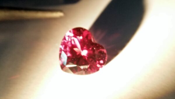 Natural Colour Change Rhodolite Garnet Weight : 2.10Cts Dimension: 7.6 mm x 8.3mm x 4.7 mm Colour: changing colors Red to purplish pink Clarity : Clean Shape : Heart Birthstone : January Treatment : Unheated/Natural