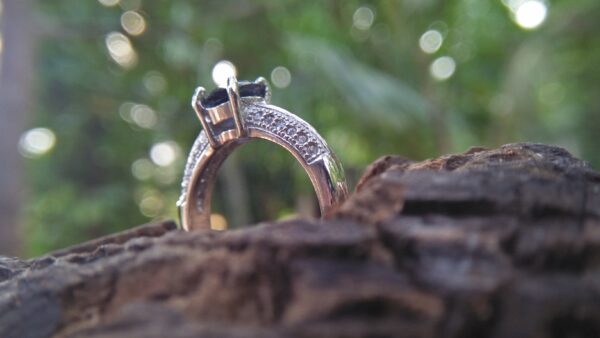 Natural Blue Spinel Standard 925 Silver Ring Stone : Natuarl Blue Sapinel Shape : Round Brilliant Cut ( Diamond Cut) Clarity : Clean Treatment : Natural/Unheated Dimension : 6.1 mm x 3.1mm Mineral : City of gem Ratnapura Sri Lanka Metal : Standard 925 Silver Other : Also, We attached 24 AD's (American Diamond) to get more luster & More Beauty.