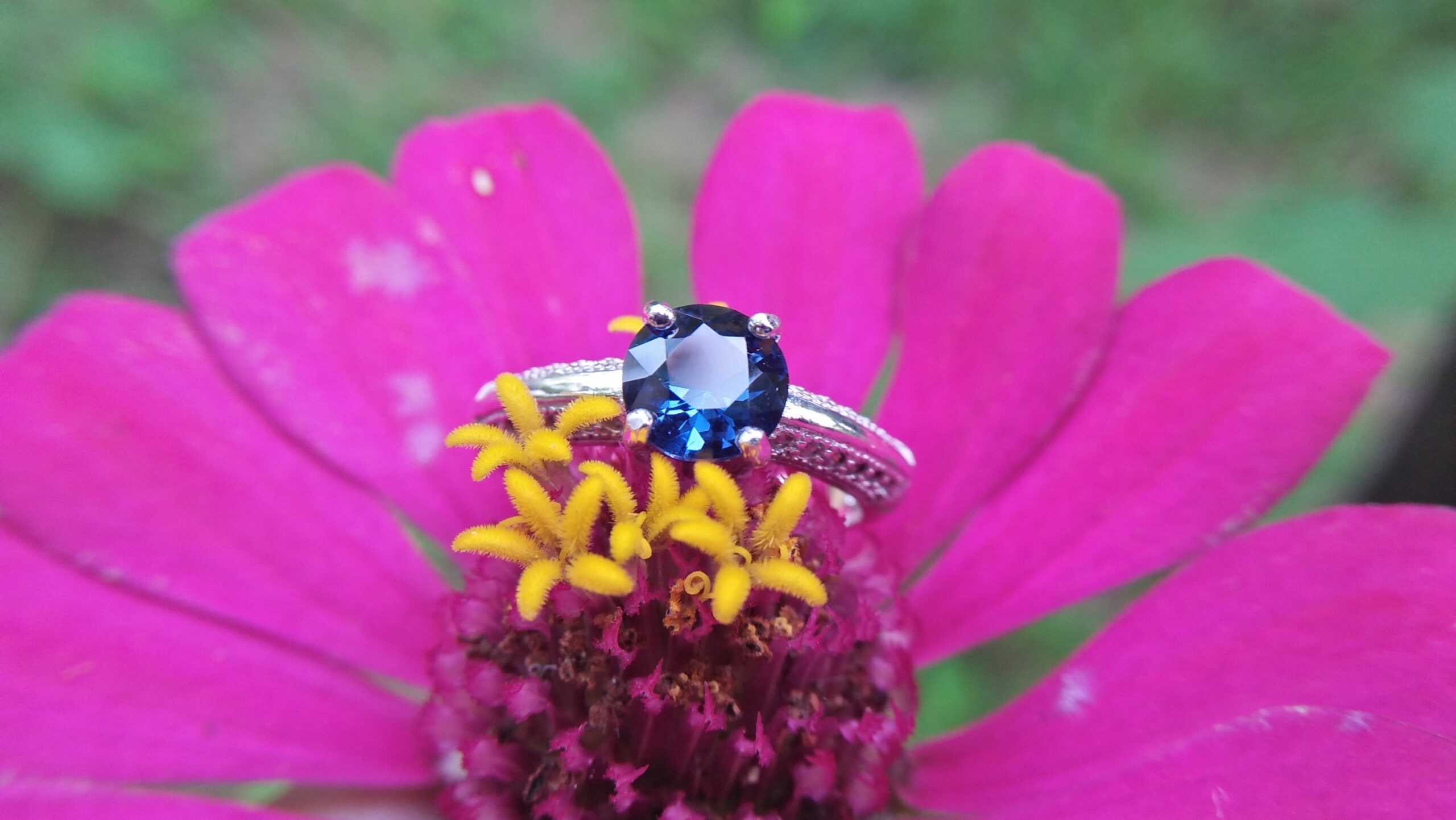Natural Blue Spinel Standard 925 Silver Ring Stone : Natuarl Blue Sapinel Shape : Round Brilliant Cut ( Diamond Cut) Clarity : Clean Treatment : Natural/Unheated Dimension : 6.1 mm x 3.1mm Mineral : City of gem Ratnapura Sri Lanka Metal : Standard 925 Silver Other : Also, We attached 24 AD's (American Diamond) to get more luster & More Beauty.