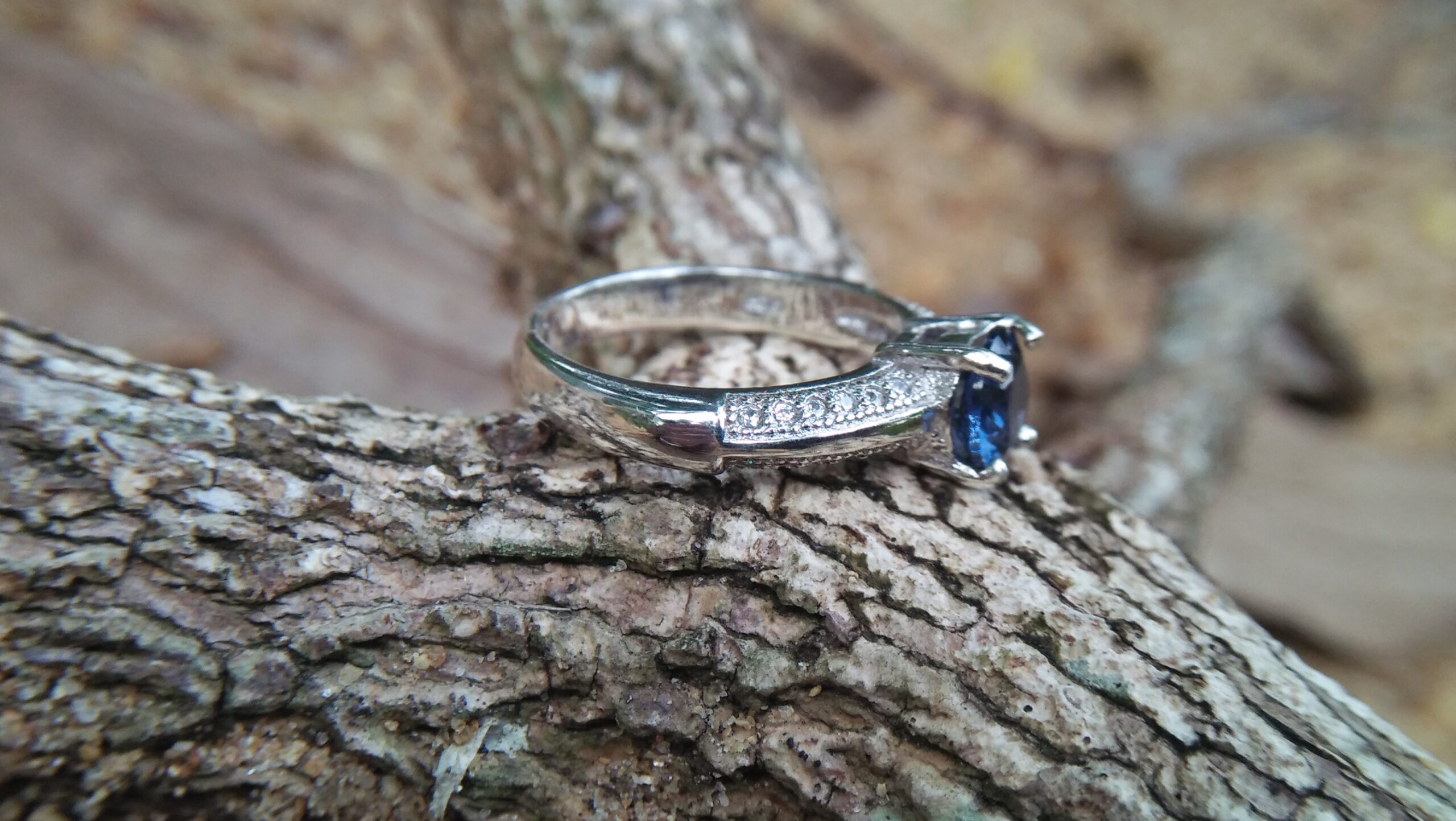 Natural Blue Spinel Standard 925 Silver Ring Stone : Natuarl Blue Sapinel Shape : Round Brilliant Cut ( Diamond Cut) Clarity : Clean Treatment : Natural/Unheated Dimension : 6.1 mm x 3.1mm Mineral : City of gem Ratnapura Sri Lanka Metal : Standard 925 Silver Other : Also, We attached 24 AD's (American Diamond) to get more luster & More Beauty.