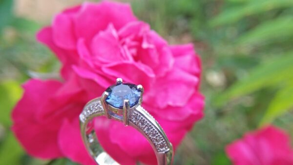 Natural Blue Spinel Standard 925 Silver Ring Stone : Natuarl Blue Sapinel Shape : Round Brilliant Cut ( Diamond Cut) Clarity : Clean Treatment : Natural/Unheated Dimension : 6.1 mm x 3.1mm Mineral : City of gem Ratnapura Sri Lanka Metal : Standard 925 Silver Other : Also, We attached 24 AD's (American Diamond) to get more luster & More Beauty.