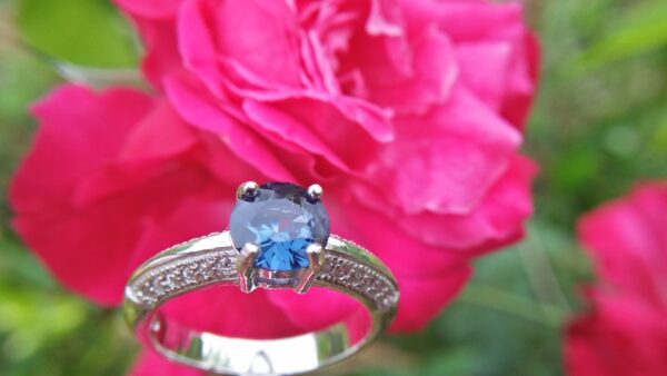 Natural Blue Spinel Standard 925 Silver Ring Stone : Natuarl Blue Sapinel Shape : Round Brilliant Cut ( Diamond Cut) Clarity : Clean Treatment : Natural/Unheated Dimension : 6.1 mm x 3.1mm Mineral : City of gem Ratnapura Sri Lanka Metal : Standard 925 Silver Other : Also, We attached 24 AD's (American Diamond) to get more luster & More Beauty.