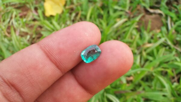 Natural Colombian Emerald Clarity : SI Treatment : Natural/Unheated Dimension : 7.95mm x 5.6mm x 3.61mm Weight : 1.05 Cts Birthstone : May Mineral : Colombia