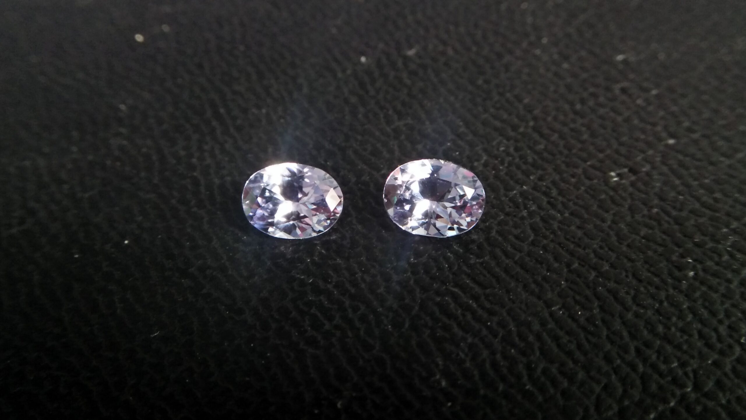 NATURAL Lavender Spinel Pair Shape : Ovel Clarity : SI Treatment : Natural/Unheated Dimension : 6.5mm x 5mm x 3mm ( Both Same) Weight : 1.45Cts (Both) Cut : Flower Cut Dispersion : Good Colour : Light Lavender
