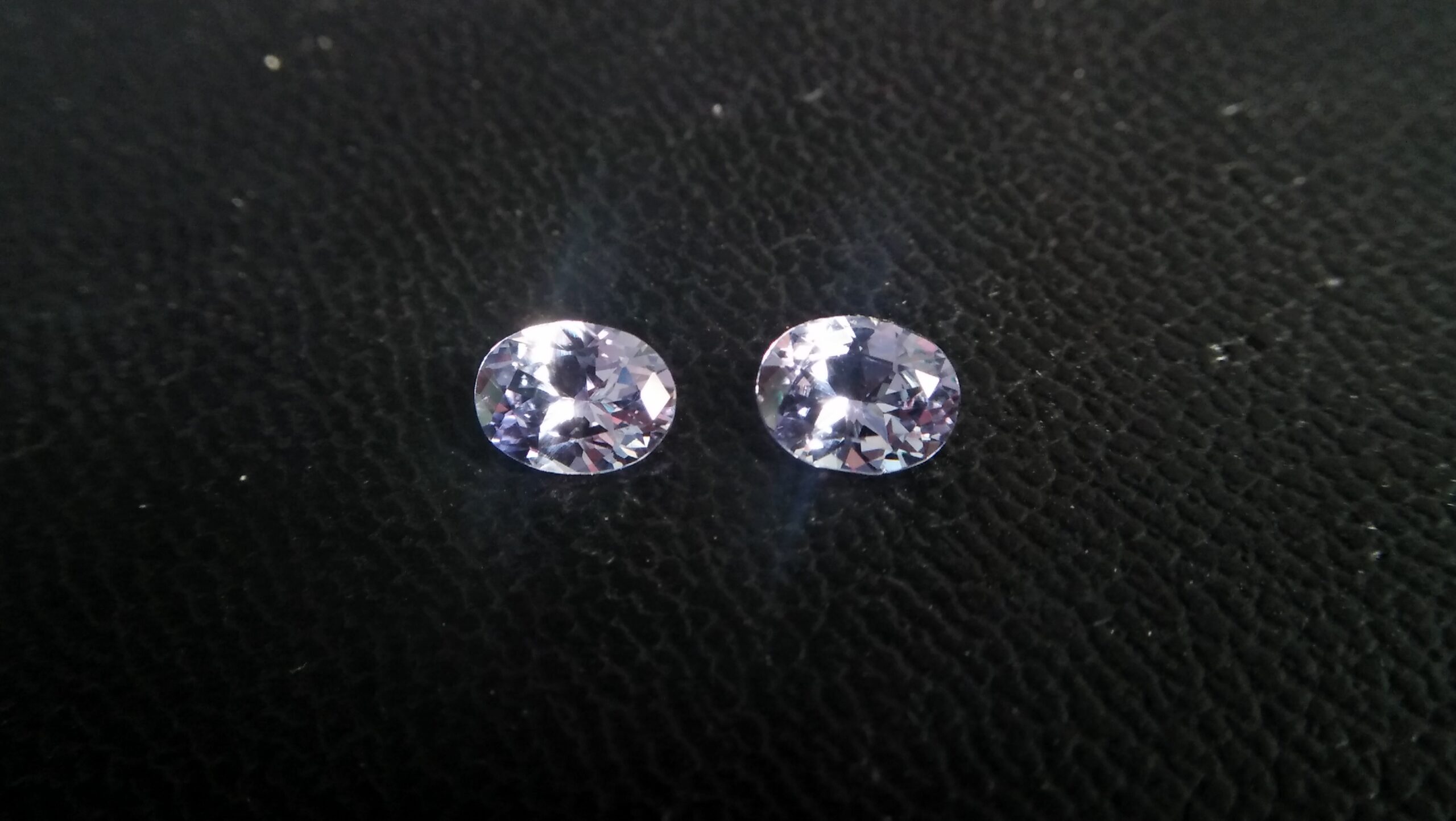 NATURAL Lavender Spinel Pair Shape : Ovel Clarity : SI Treatment : Natural/Unheated Dimension : 6.5mm x 5mm x 3mm ( Both Same) Weight : 1.45Cts (Both) Cut : Flower Cut Dispersion : Good Colour : Light Lavender