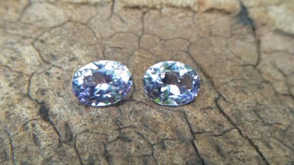NATURAL Lavender Spinel Pair Shape : Ovel Clarity : SI Treatment : Natural/Unheated Dimension : 6.5mm x 5mm x 3mm ( Both Same) Weight : 1.45Cts (Both) Cut : Flower Cut Dispersion : Good Colour : Light Lavender