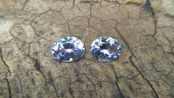 NATURAL Lavender Spinel Pair Shape : Ovel Clarity : SI Treatment : Natural/Unheated Dimension : 6.5mm x 5mm x 3mm ( Both Same) Weight : 1.45Cts (Both) Cut : Flower Cut Dispersion : Good Colour : Light Lavender