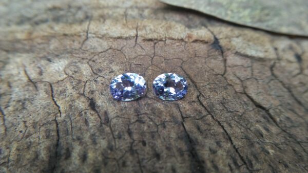 NATURAL Lavender Spinel Pair Shape : Ovel Clarity : SI Treatment : Natural/Unheated Dimension : 6.5mm x 5mm x 3mm ( Both Same) Weight : 1.45Cts (Both) Cut : Flower Cut Dispersion : Good Colour : Light Lavender