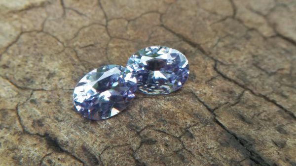 NATURAL Lavender Spinel Pair Shape : Ovel Clarity : SI Treatment : Natural/Unheated Dimension : 6.5mm x 5mm x 3mm ( Both Same) Weight : 1.45Cts (Both) Cut : Flower Cut Dispersion : Good Colour : Light Lavender