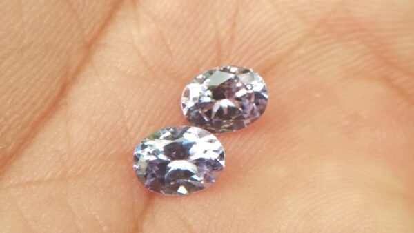 NATURAL Lavender Spinel Pair Shape : Ovel Clarity : SI Treatment : Natural/Unheated Dimension : 6.5mm x 5mm x 3mm ( Both Same) Weight : 1.45Cts (Both) Cut : Flower Cut Dispersion : Good Colour : Light Lavender