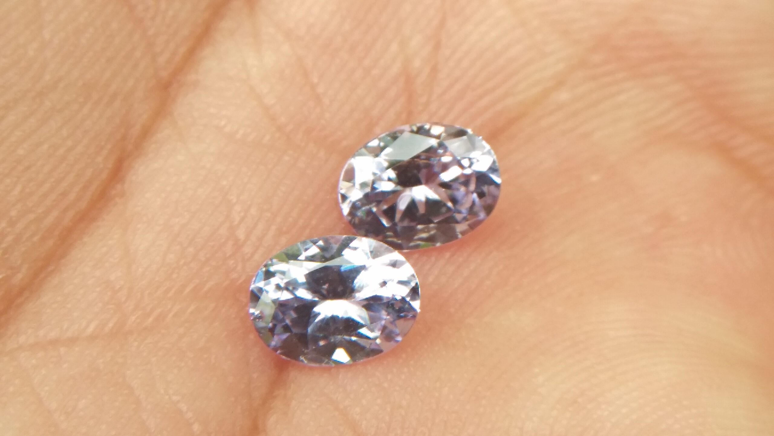 NATURAL Lavender Spinel Pair Shape : Ovel Clarity : SI Treatment : Natural/Unheated Dimension : 6.5mm x 5mm x 3mm ( Both Same) Weight : 1.45Cts (Both) Cut : Flower Cut Dispersion : Good Colour : Light Lavender