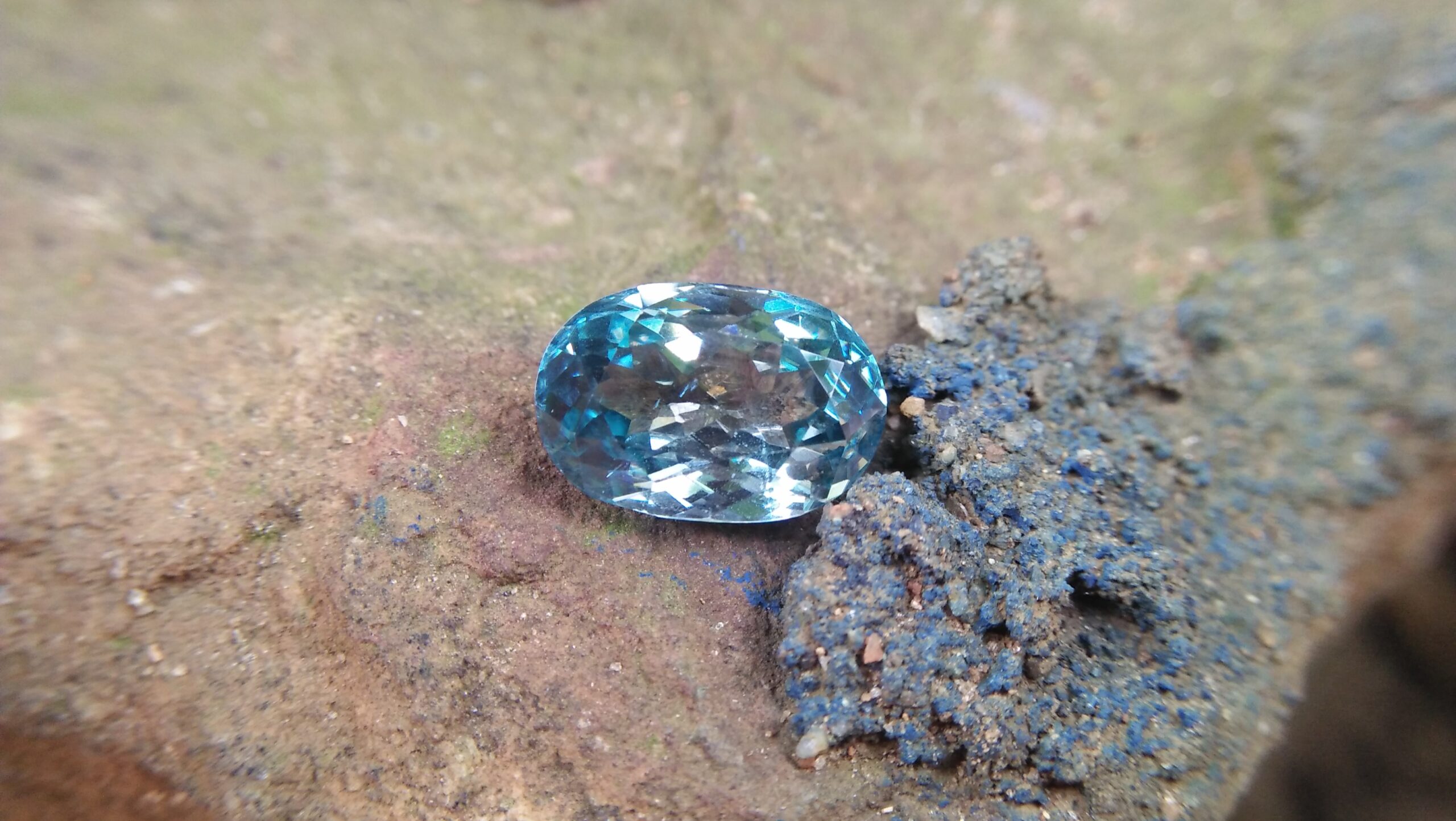 Natural Genuine Blue Zircon - Starlite WEIGHT : 13.03ct COLOUR : Vivid Greenish Blue CUT & SHAPE : Fancy Oval TRANSPARENCY : Transparent MEASUREMMENT : 15.2x 10.35 x 7.21mm SPECREUM : Rare earth spectrum TREATMENT : None "GLK" Certified ( GIA Alumni Association Member/ Member of Gemmological association Great Britain) GLK : UN - 01484 • Blue zircon is one of the US birthstones for December