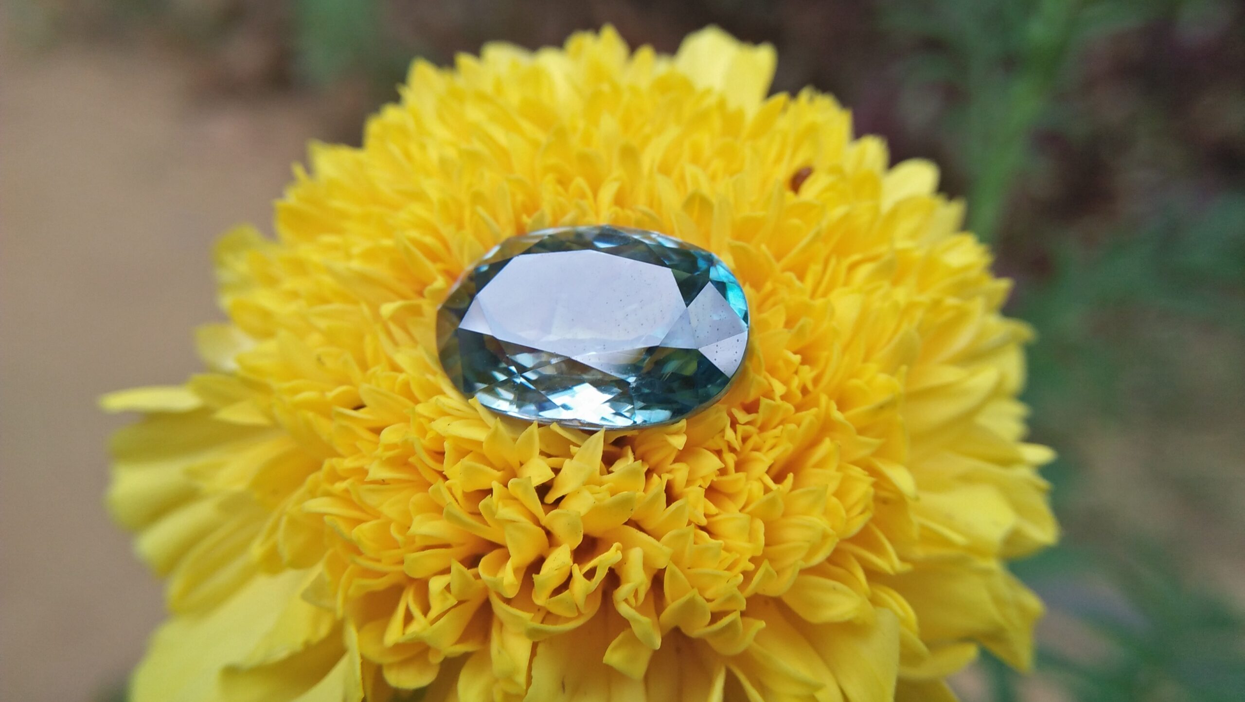 Natural Genuine Blue Zircon - Starlite WEIGHT : 13.03ct COLOUR : Vivid Greenish Blue CUT & SHAPE : Fancy Oval TRANSPARENCY : Transparent MEASUREMMENT : 15.2x 10.35 x 7.21mm SPECREUM : Rare earth spectrum TREATMENT : None "GLK" Certified ( GIA Alumni Association Member/ Member of Gemmological association Great Britain) GLK : UN - 01484 • Blue zircon is one of the US birthstones for December