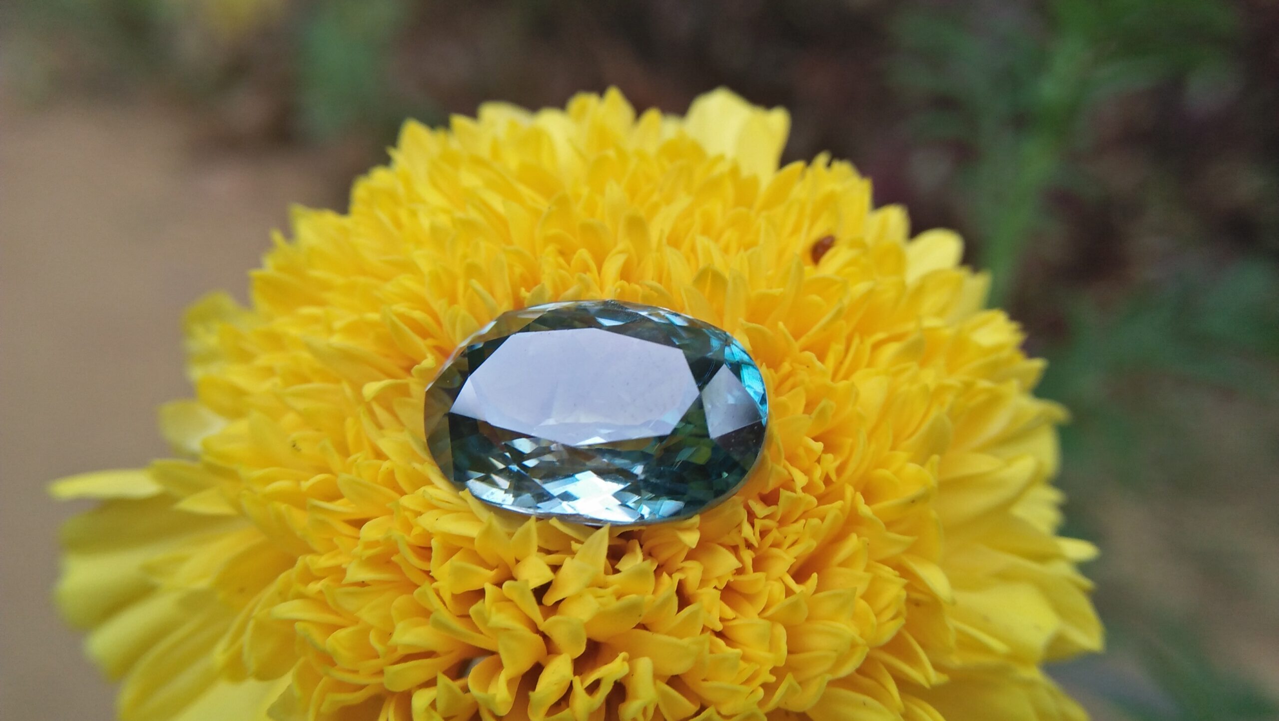 Natural Genuine Blue Zircon - Starlite WEIGHT : 13.03ct COLOUR : Vivid Greenish Blue CUT & SHAPE : Fancy Oval TRANSPARENCY : Transparent MEASUREMMENT : 15.2x 10.35 x 7.21mm SPECREUM : Rare earth spectrum TREATMENT : None "GLK" Certified ( GIA Alumni Association Member/ Member of Gemmological association Great Britain) GLK : UN - 01484 • Blue zircon is one of the US birthstones for December